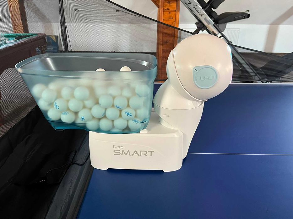 Robot Tenis de Masa Pusun Dora Smart Pro – NOU in cutie + Fileu Colector + 150 Mingi