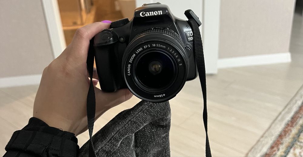 Фотокамера Canon EOS 1100D Kit 18-55 II черный