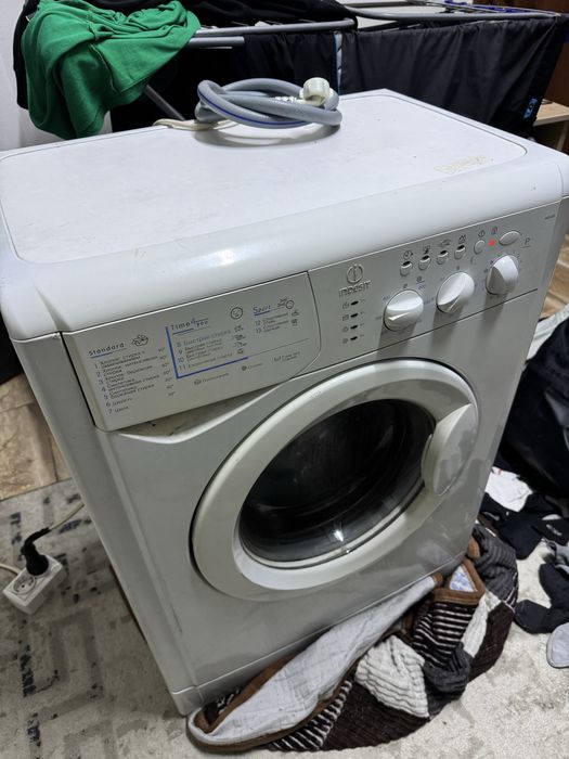 Стиралка жұмыс істеп тұр