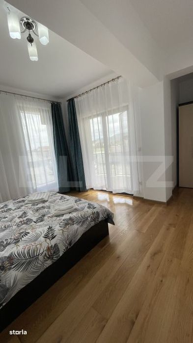 Apartament bloc nou, 72 mp, 2 dormitoare si living, parter, zona Nord