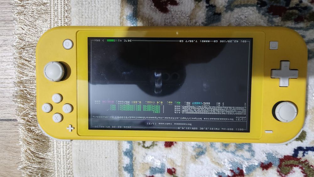 Продаю Nintendo lite прошитый