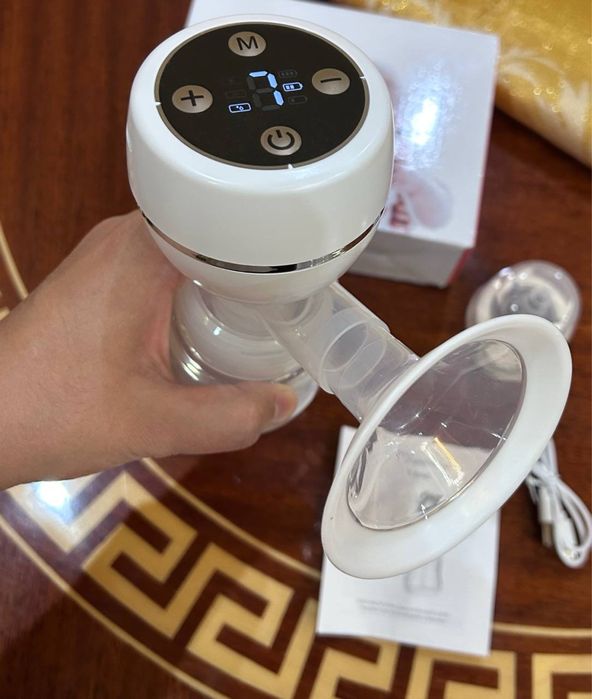 Электрический молокоотсос грудосос