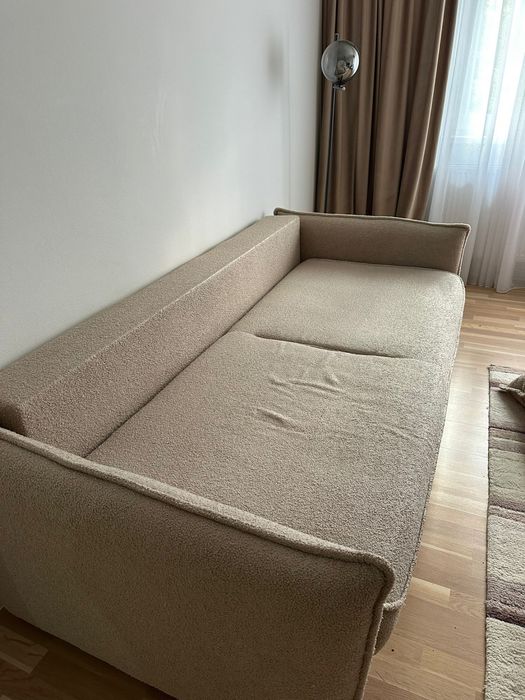 Canapea boucle extebsibila si cu spatiu de depozitare