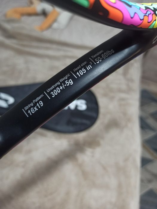 Теннисная ракетка