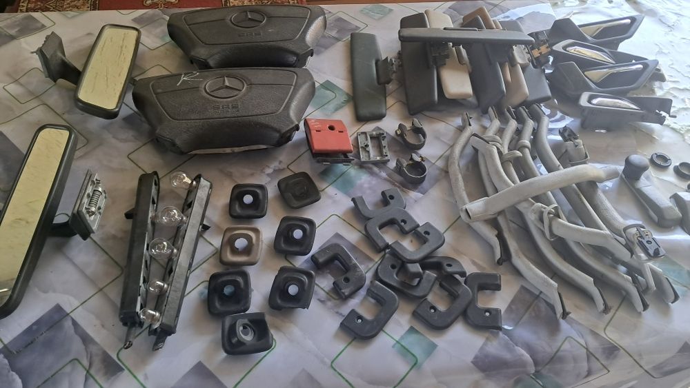 Мерс124Е.стеклопадемник консоль.