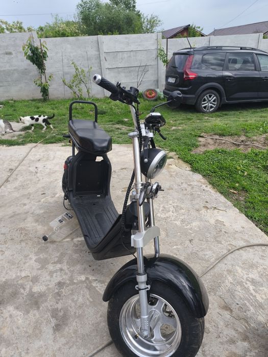 vând schimb scuter electric