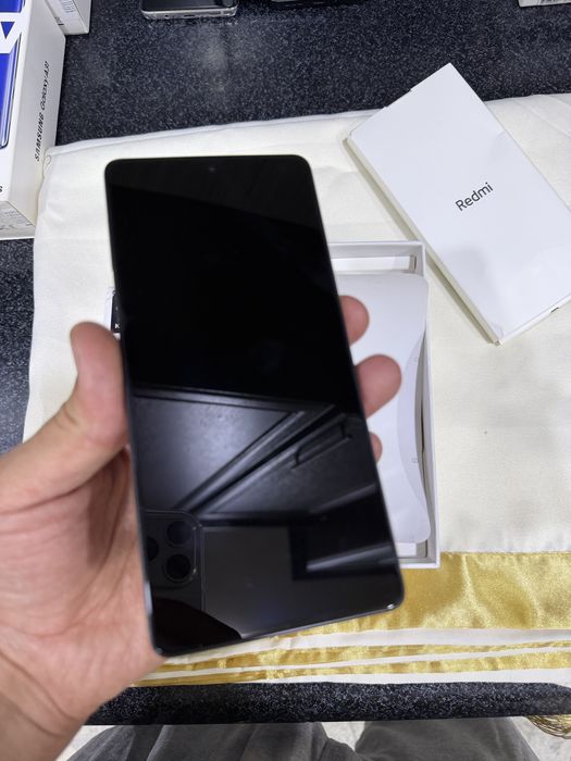 redmi not 14s pamit 8.256g holati ideal karopka dak bor