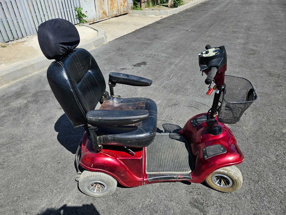 Scuter electric 4 roți Pride Mobility (Model clasic robust - Defect minor)