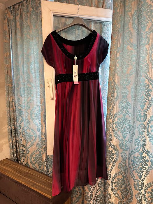 Платья.          .