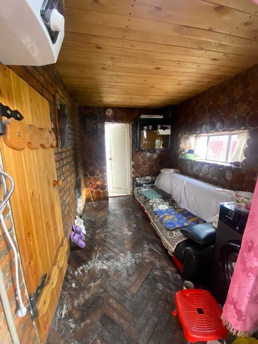 Дом, улица Калиева, Танат Империя