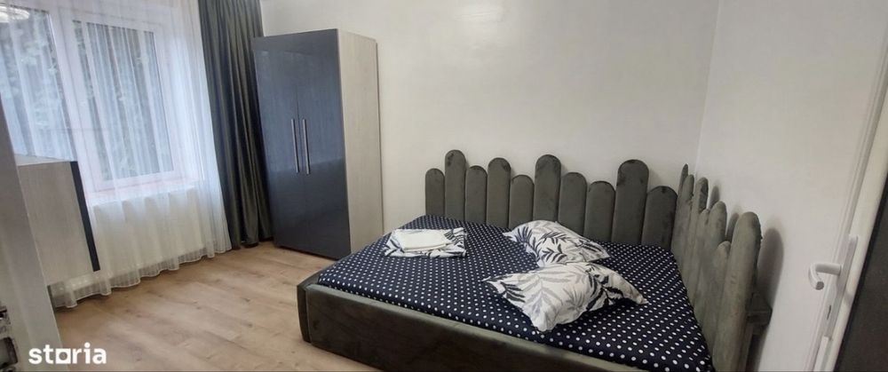 Inchiriez apartament in regim hotelier .