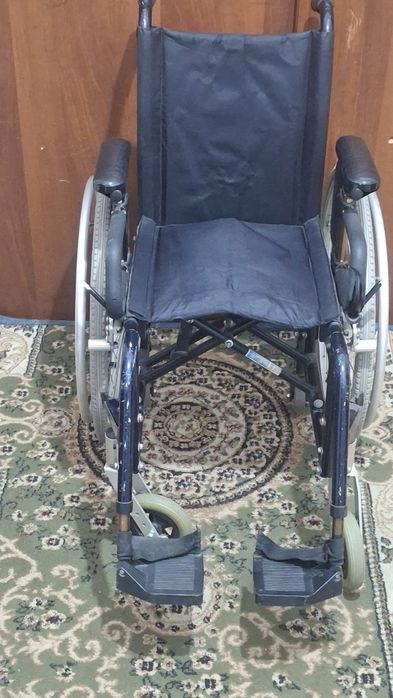 Инвалидная коляска