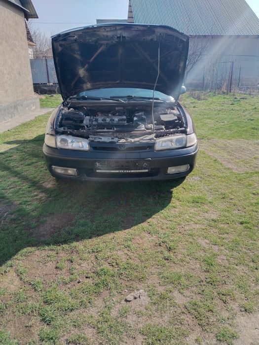 Мазда кронос 2 обем