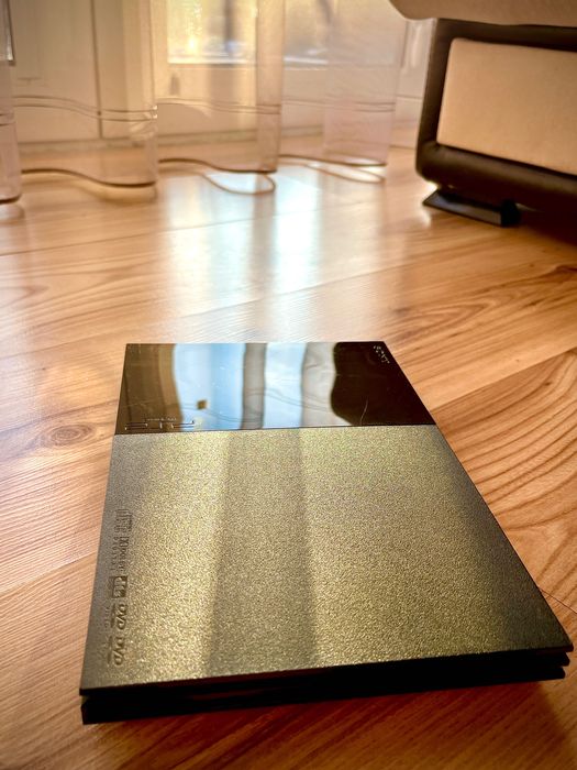 Ps2 slim + една игра