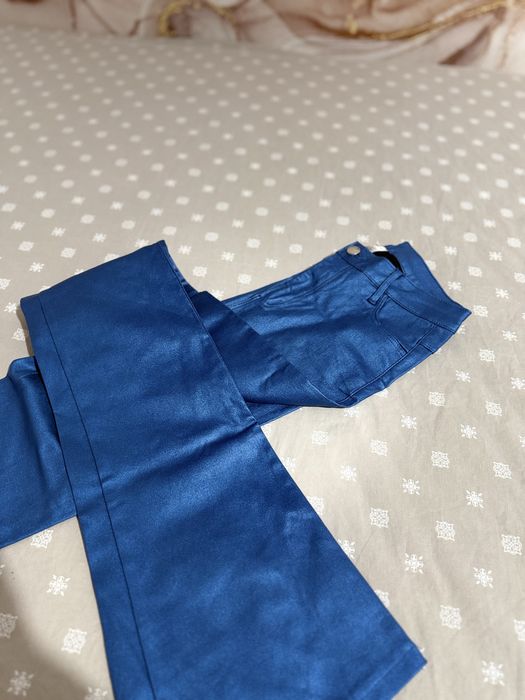 Pantaloni piele  evazati  albastru metalic