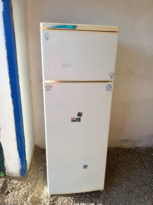 Продам  рабочий холодильник .