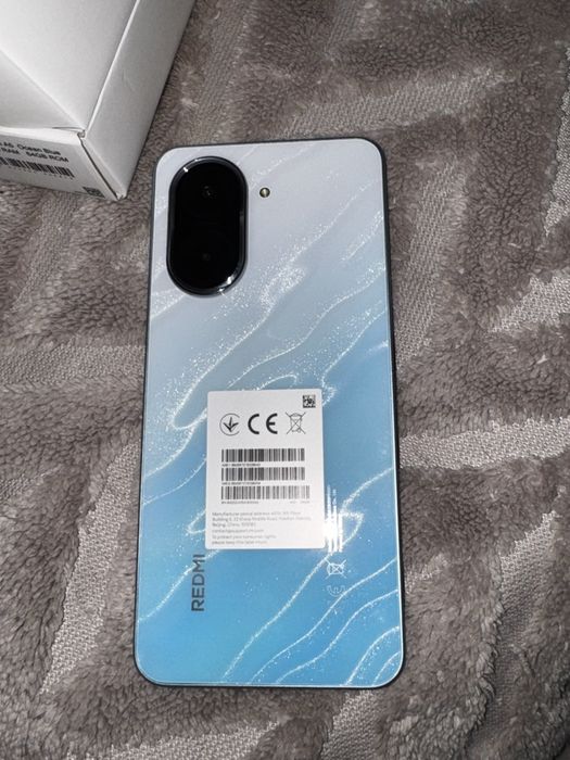 Redmi A5 нов.
