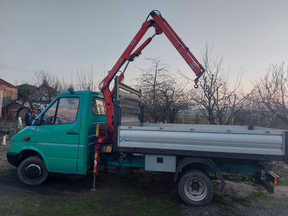 trasport marfa basculabil cu macara