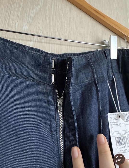 Pantaloni evazati aspect denim XL Mango