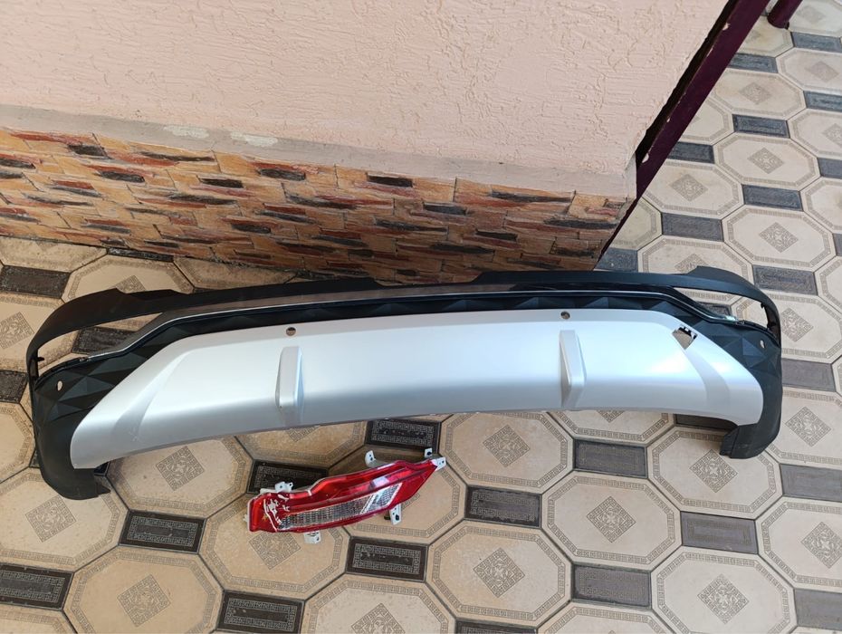 Задний бампер и поворотник Tucson