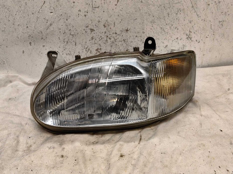 Оригинален фар Форд  Ford Escort 97-2000