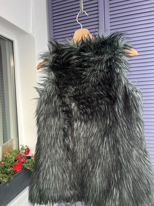 Vesta blana sintetica