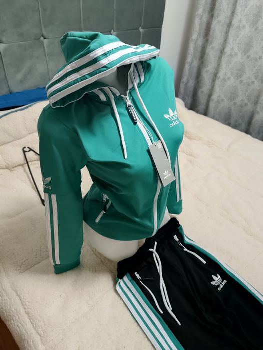 Trening complet Adidas 2 modele, unul de femei unul bărbați