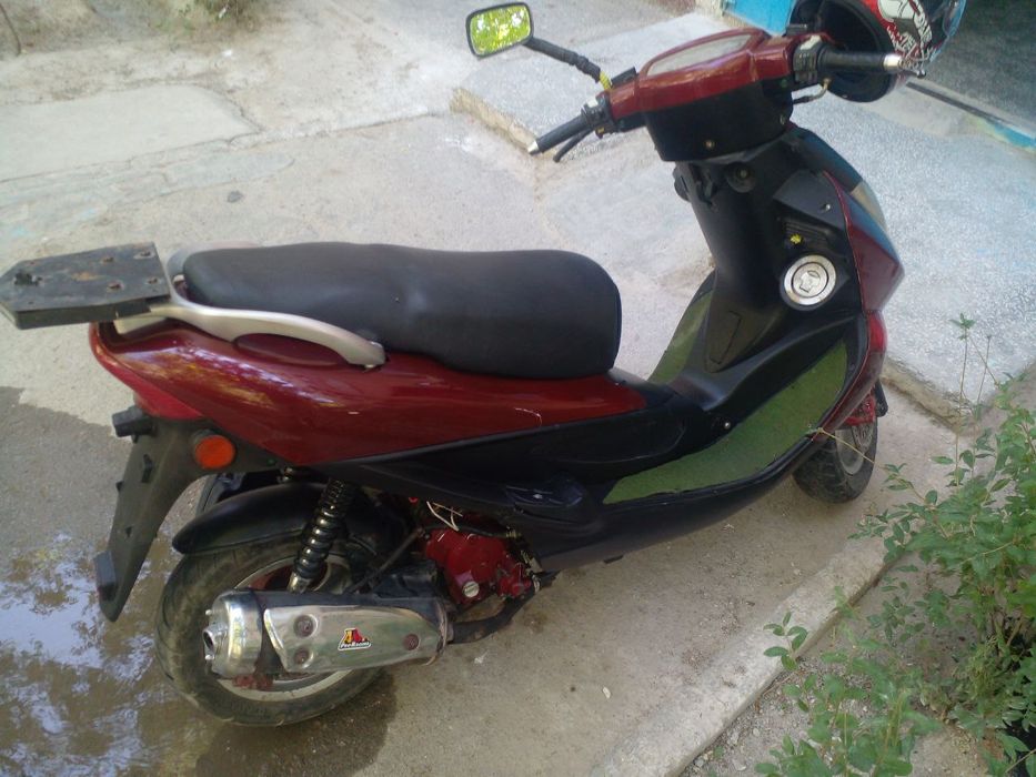 Продается скутер  Kymco bet&win 150
водное охлаждения
Объем цил