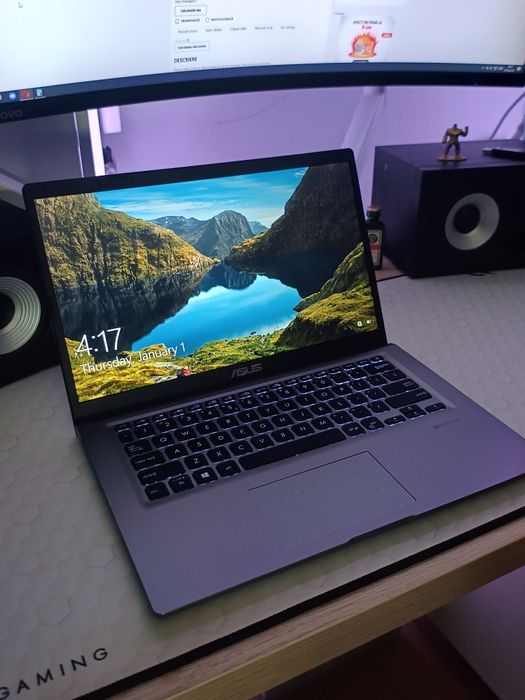 Laptop ultra portabil 14'  Asus M415U