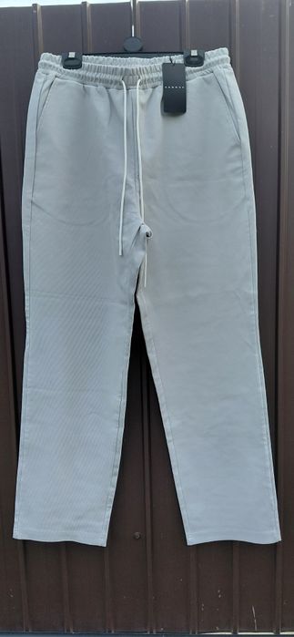 Pantaloni sport-casual SUMWON bej deschis, noi cu etichetă, L–XL