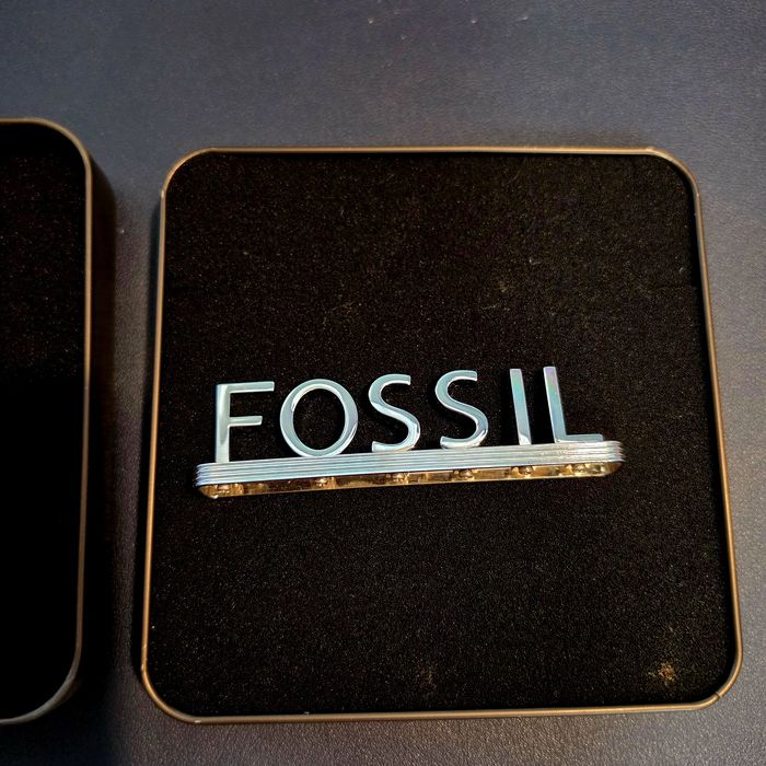 square metal collector's tin from the brand Fossil