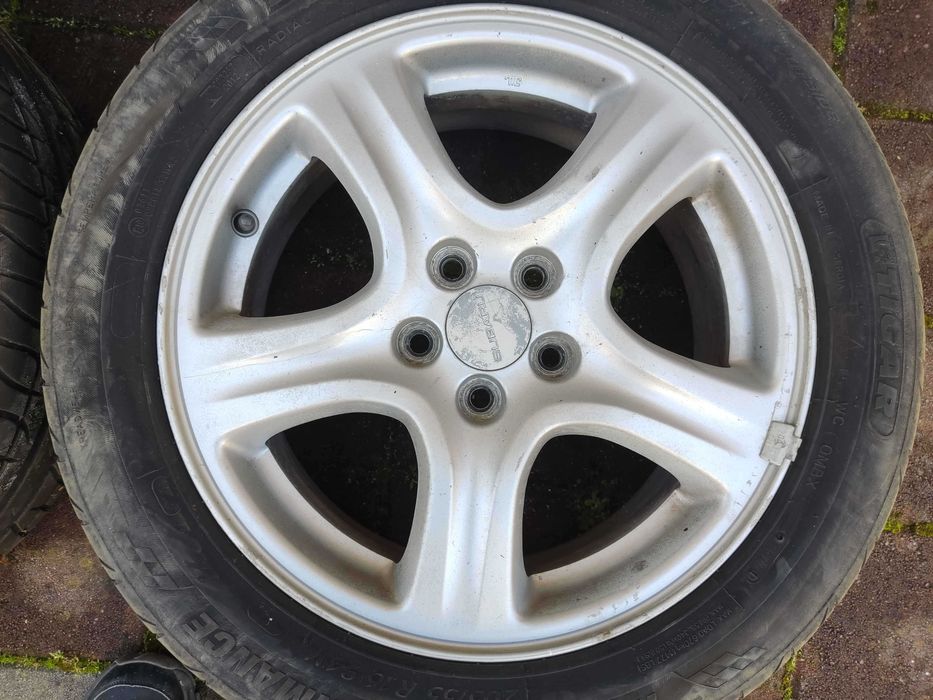 16 5 100 от Subaru с гуми