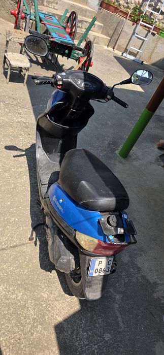 Скутер Husgvarna