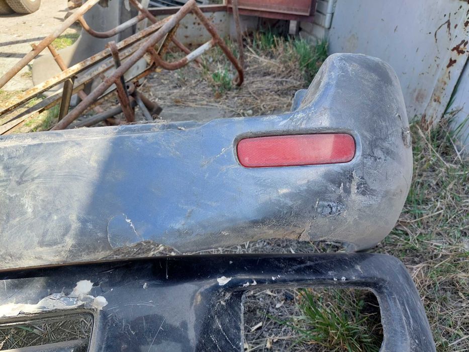 Задний бампер  на LC100