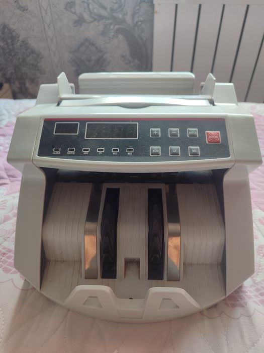 Машинка для счета денег