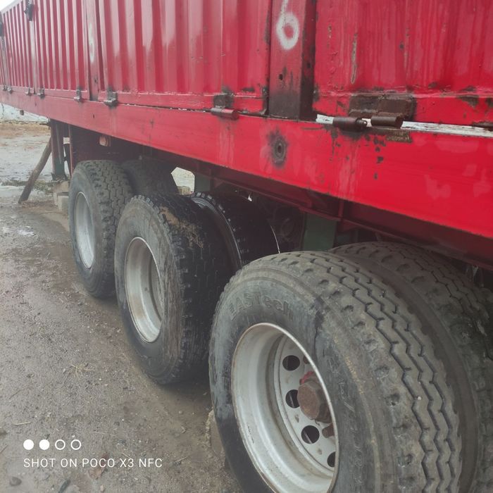 60 контейнеровоз прицеп сотилади