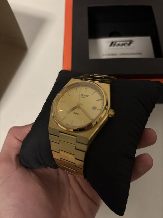 Tissot PRX Gold.