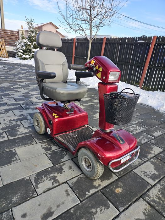 Scuter electric carut scaun persoana cu dizabilitati  Rascal