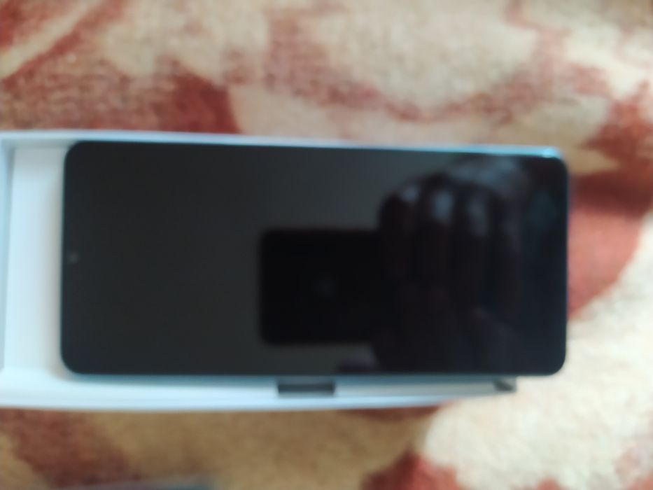 Продам новый сотовый телефон.