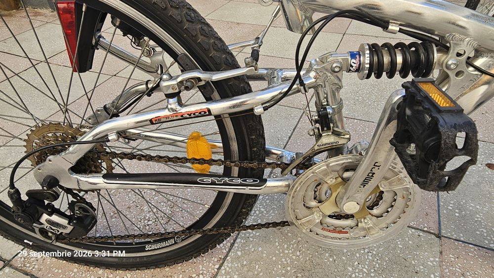 Bicicletă MTB Full Suspension 24", echipare Shimano - 450 lei