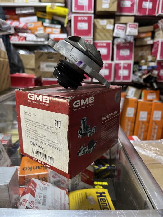 Помпа Mazda Tribute