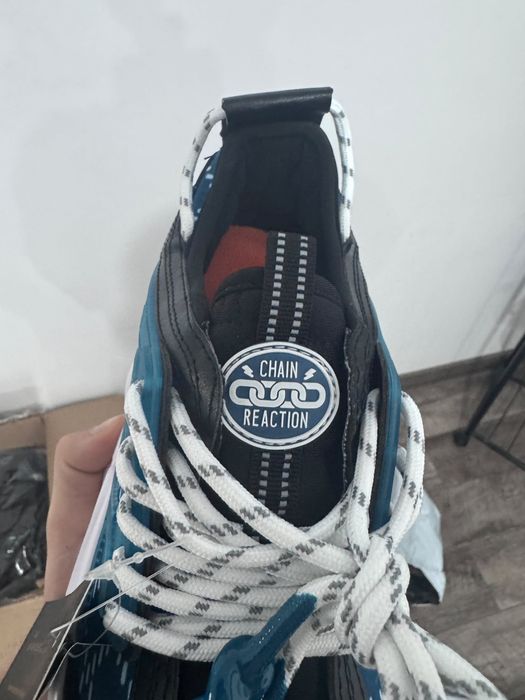 Versace chain reaction