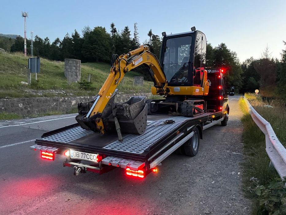 Tractari Auto Sibiu Transport Autoutilitare Utilaje ATV Moto Platforma