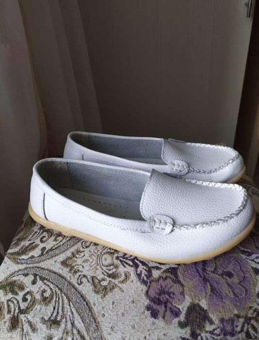 Новые кожаные туфли