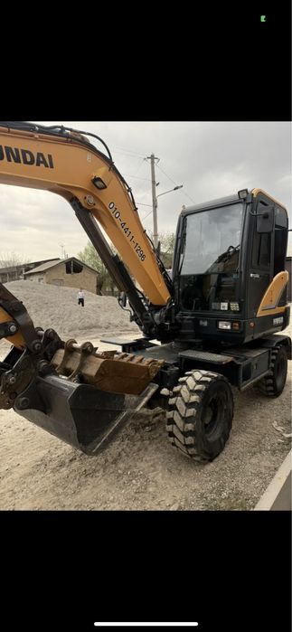 Эксковатор Колесный ,Малютка 55,60