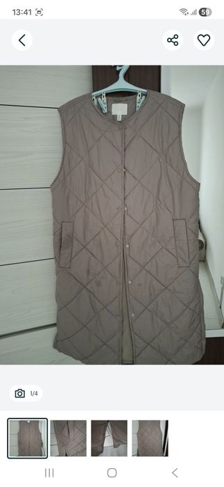 Pătură cu o  pernă de decor.