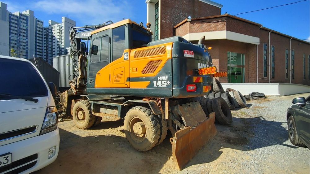 Гидромолот экскаватор колёсный