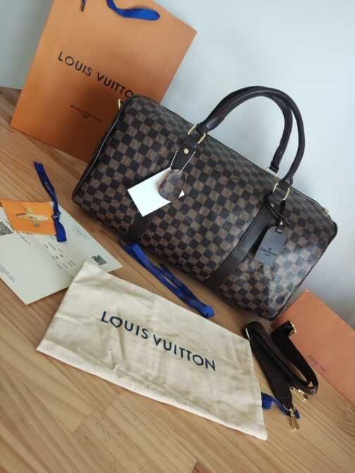 In stoc voiaj, geanta sport piele Louis Vuitton 1109.12