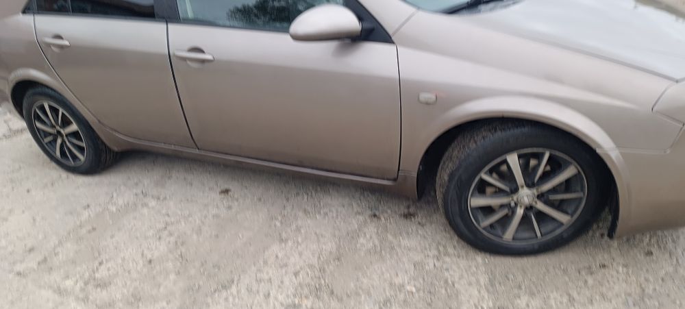 Nissan primera 2004 год