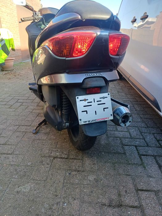 Scuter honda 250 cc